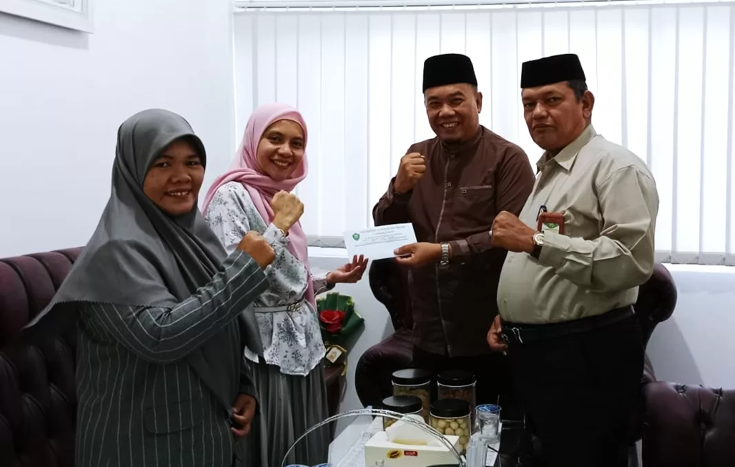 UNIVERSITAS AL WASHLIYAH MEDAN LEPAS DOSEN TERBAIK KE AMERIKA SERIKAT